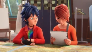 Marc looking over the comic book with Nathaniel