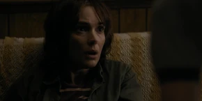 Joyce startled before she snaps back to reality.