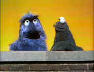 Cookie Monster and Herry Monster are in the skit Monster Noises.