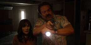 Joyce and Hopper unable to understand what the men are saying due to not being fluent in Russian.