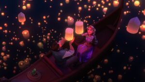 Rapunzel and Eugene releasing their lanterns into the sky.