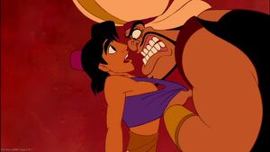 Razoul grabs Aladdin.