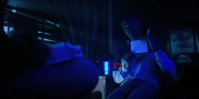 Lucas showing the word "hi" and a smiley face to Max.