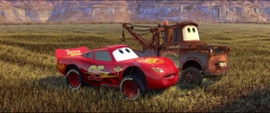 McQueen and Mater before being blown away by the tractor.
