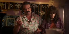 Joyce reading land deeds as Hopper questions Kline.