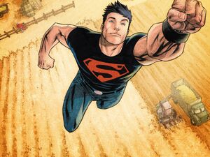 Superboy in his new costume while flying.