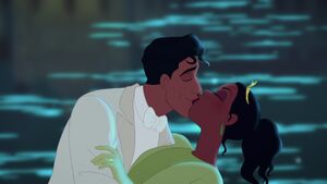 Tiana and Naveen sharing a kiss.