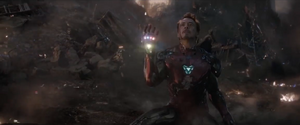 Iron Man with the stones after Thanos states he's inevitable.