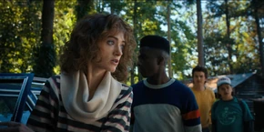 Lucas, Nancy, Steve, and Dustin having gotten out of the car after arriving at Lovers' Lake.