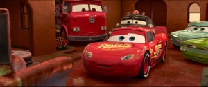 McQueen asking Mater to join him in the World Grand Prix, which he happily accepts.