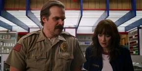 Joyce about to walk away when she sees a customer.