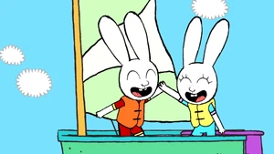 Simon and Mary high-fiving on a boat