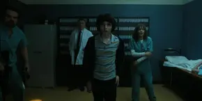 Joyce, Hopper, Mike, and Owens seeing Bob through a CCTV camera monitor.