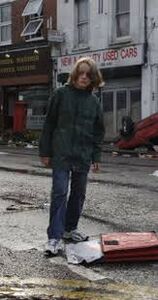 Andy standing outside the pizza place in London