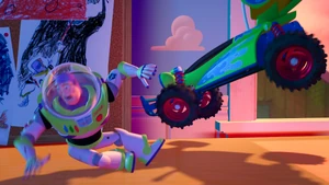 Buzz jumps out of the way before RC can push him into the crevice.