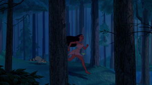 Meeko running through the forest with Pocahontas.