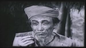 Old Man Hạc crying after selling Vàng.