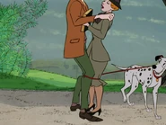 Anita being tied up to Roger.