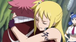 Lucy hugs Natsu