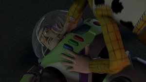 Buzz closes his helmet on Woody's hand