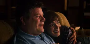 Joyce and Bob enjoying a TV show together.