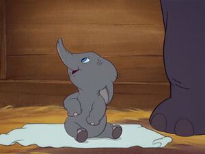 Dumbo meeting the other circus elephants.