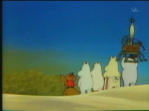The Moomin family looks at the collapsed pyramid