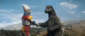 Godzilla Shaking Hands With Jet Jaguar.