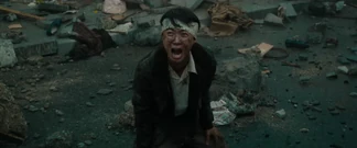 Shikishima screams in anguish and rage at Godzilla after Noriko's apparent death