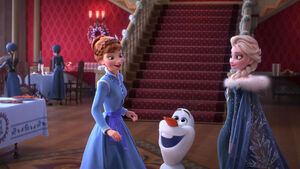 Elsa, Olaf, and Anna getting ready to host a Christmas party.