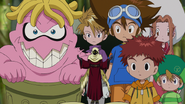 Taichi and others with Garbagemon and Wisemon