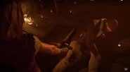 Maya crippling Franco by shooting his knees with a pistol.