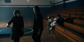 Joyce and Jonathan going to follow Hopper when he starts to leave.