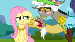 Discord grabbing Fluttershy's cheek S3E10