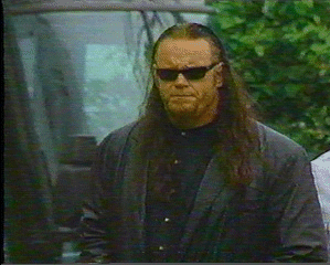 The Undertaker silently mourning the death of Owen Hart.