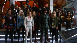 Earth-1 heroes and Earth-X rebels listens to Oliver of Earth-X's bargain