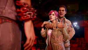 Abigail being held by Reggie, who wants her to put her into custody.