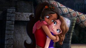 Princess Elena thanking Sofia for freeing her from inside her amulet by giving her a big hug.