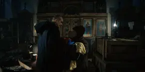 Joyce and Hopper walking past each other as they go to change their clothes.