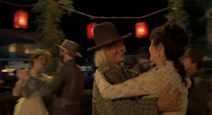 Doc dances with Clara Clayton at the Hill Valley Festival.