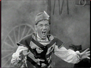 Shemp screaming in pain after he sat on a hot horseshoe.