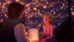 Rapunzel having been surprised by Eugene with their own two lanterns.