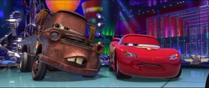McQueen telling Mater that the drinks are free.