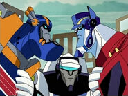 Jazz breaking up an argument between Optimus and Sentinel.
