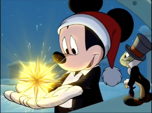 Mickey Mouse holding a magical wishing star for Christmas.