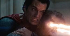 Clark preparing to stop Zod from killing a family.