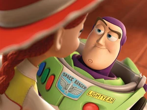 Buzz smiling as Jessie tells him to dance with her