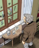 Roger looks at the photo of Watari and L.