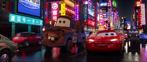 McQueen and Mater amazed by the sights they are seeing in Tokyo.