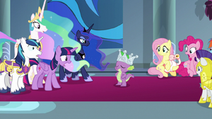 Rainbow Dash's face in the background.